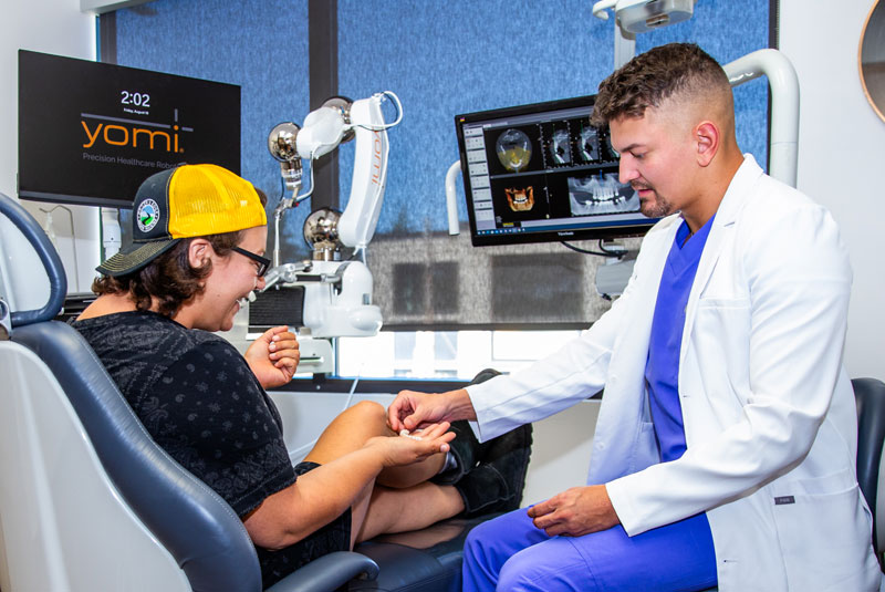 jessica with the doctor discussing implants